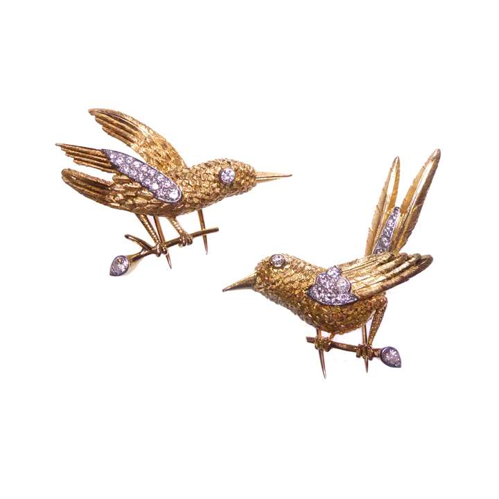 Set of two gold and diamond bird brooches